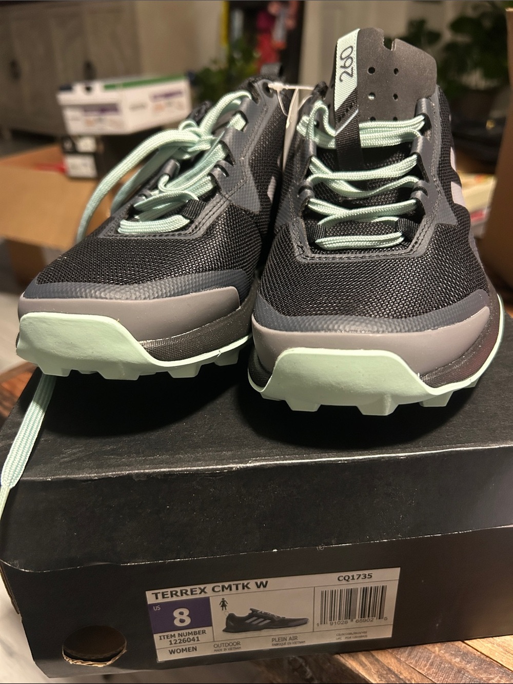 adidas black trail sneakers with mint green accents